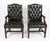 This is an elegant vintage pair of leather 'Gainsborough chairs' in a beautiful basil green colour, dating from the late...