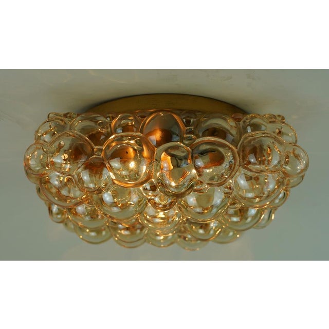 Large Mid-Century Modern Bubble Amber Glass Ceiling Light, 1960s, in Good conditions. Designed 1960 to 1969 Up to 250V...