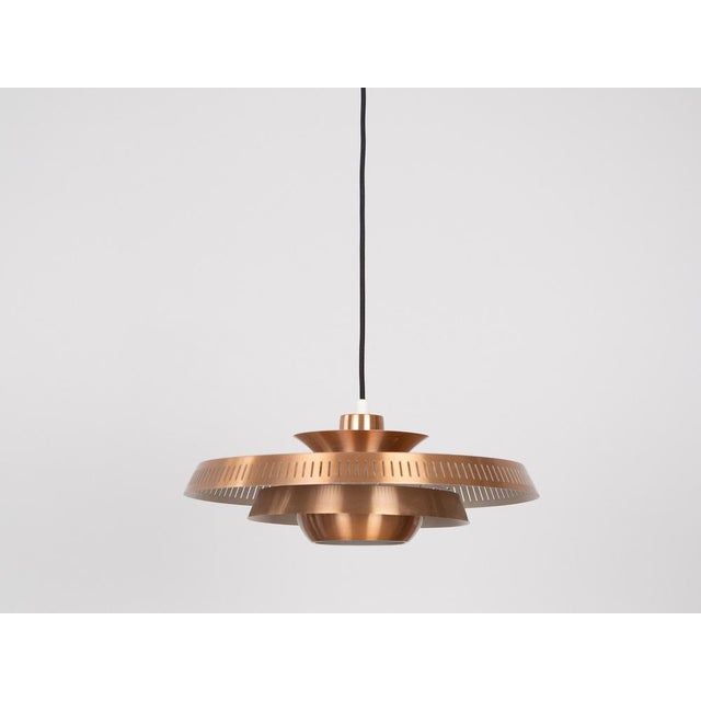 Vintage aluminum lamp designed for the Danish Fog og Morup. Dimensions: Diameter: 44cm Height: 20cm The lamp is in very...