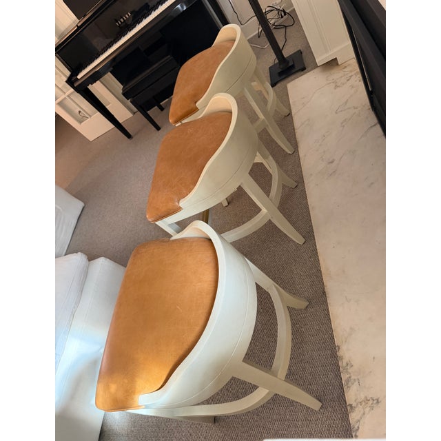 Contemporary Custom Counter Stools by Jessica Charles — Toffee Leather, Antique White Frame, Brass Footrest (Set of 3) For Sale - Image 3 of 10