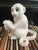 This white Capuchin ceramic/porcelain monkey is especially notable because one similar to it is prominently displayed in...