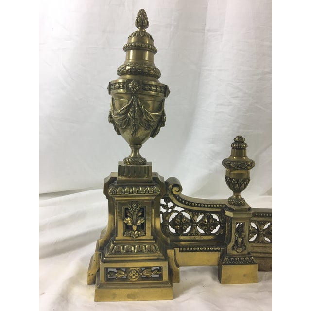 All of the detail in this exquisite chenet set screams Louis XVI! In good condition, with some tarnish and a dent in the...