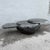Extends to 47” when swiveled open. Pull out leaf is 15”d, 19.25”w. This postmodern coffee table pairs dramatic black...