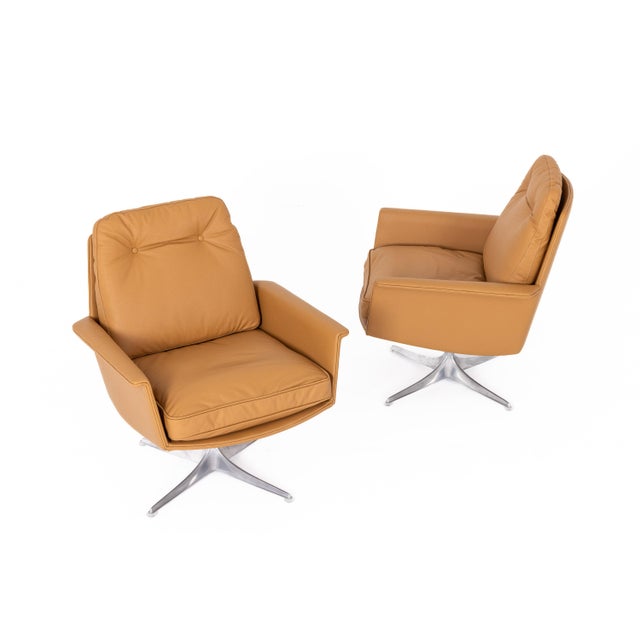 Pair of Mid-Century lounge chairs designed by Horst Burning for COR, entirely renovated in high end quality cognac aneline...