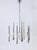 An impressive modernist chandelier from the 1960s, designed by gaetano sciolari for lightoiler, italy. Made from silvered...