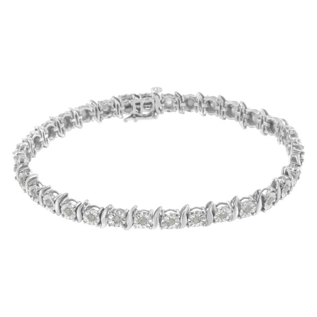 Feminine yet glamorous, this bracelet shines! The curvy settings spiral around each beautiful rose cut diamond for a...
