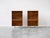 Pair of bookcases in walnut with slide-out shelves and signature aluminum hairpin legs designed by George Nelson for...