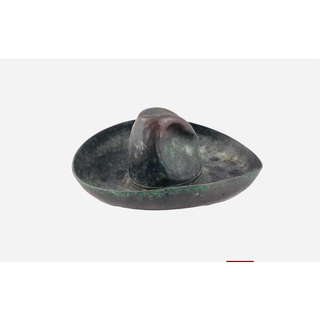A wonderfully unusual American Arts & Crafts hand-hammered copper decorative object in the form of an iconic Western...
