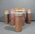 Warm, earthy, and wonderfully tactile, this set of five wheel-thrown stoneware jars/bud vases features cork stoppers and...