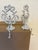These two items are weighted cast iron mantel stocking holders designed to sit securely on a ledge or fire mantel. They...
