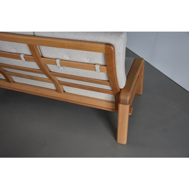 High-back mid-century sofa, high-quality production in Denmark. The frame is made with the company's typical wooden...