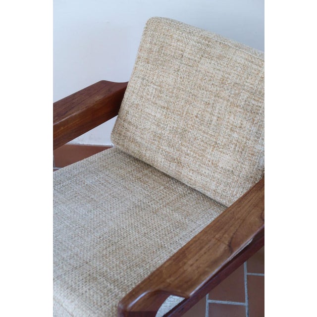 A Scandinavian teak lounge chair from the 1960s, quiet and well balanced in the way the best of that decade is. The solid...