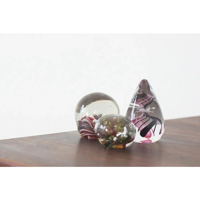 Fancy, artistic and joyful! These vintage paperweights were handcrafted by a master glassblower . This is not only a...
