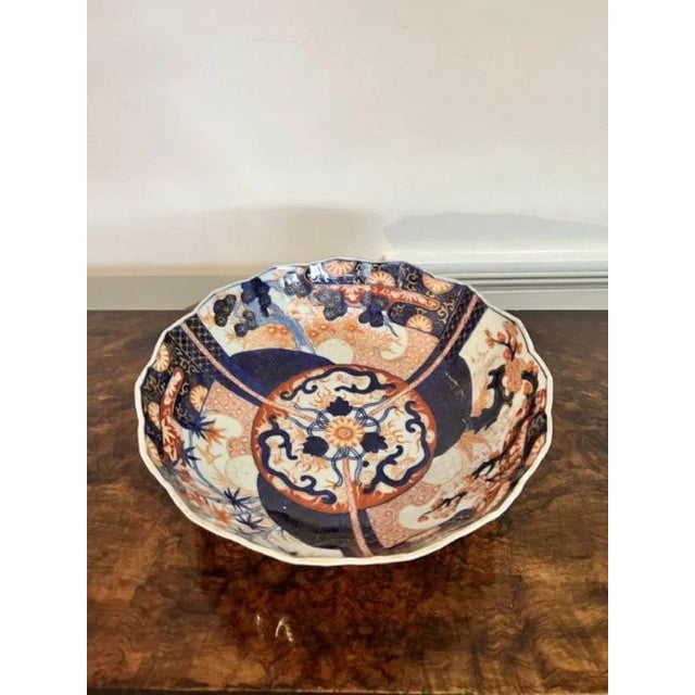 Quality antique Japanese Imari bowl having a scalloped shape edge with wonderful hand painted panels decorated with...