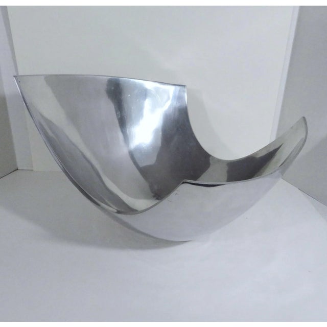 Oversize cast aluminum sculptural bowl by American designer and artist Michael Lax (1929-1999) for Metaal Grainware. Dated...