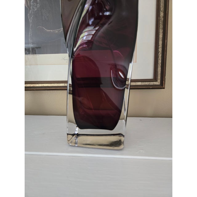 Beautiful hand blown vase, by Polish glass company Krosno Color is a purple cranberry. Please see photos , one side has a...