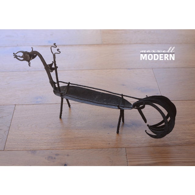 Beautiful vintage Indonesian dragon dish/sculpture made of forged iron. This piece was acquired in Bali in the 1950s and...