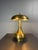 Solid brass table lamp, Italian, circa 1960s. A restrained modernist piece with a generous hemispheric dome shade topped...