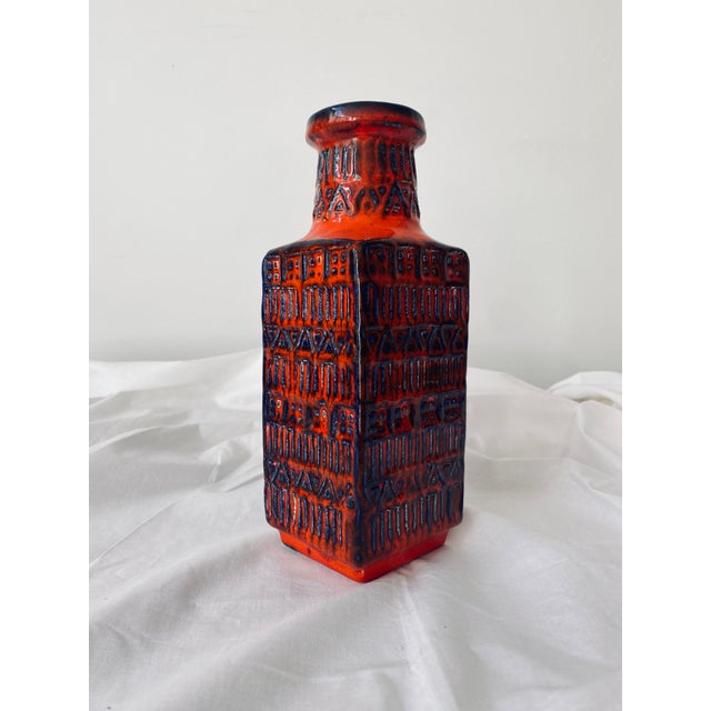 1960s, brutalist vase by BAY Keramik, Germany. Beautiful handmade pattern, hand glazed in a warm, bright red and deep...