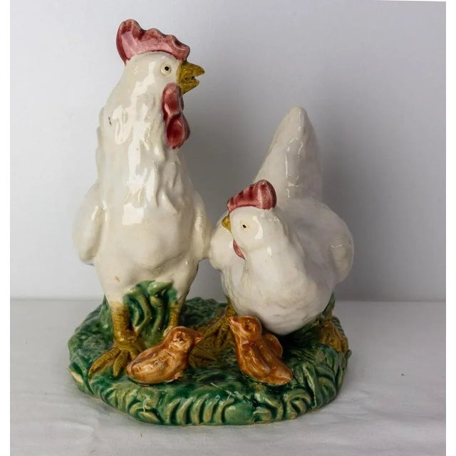 French ceramic representing a family of gallenaceae: a rooster, a hen and two chicks. Made circa 1900 Good condition. 19.5...