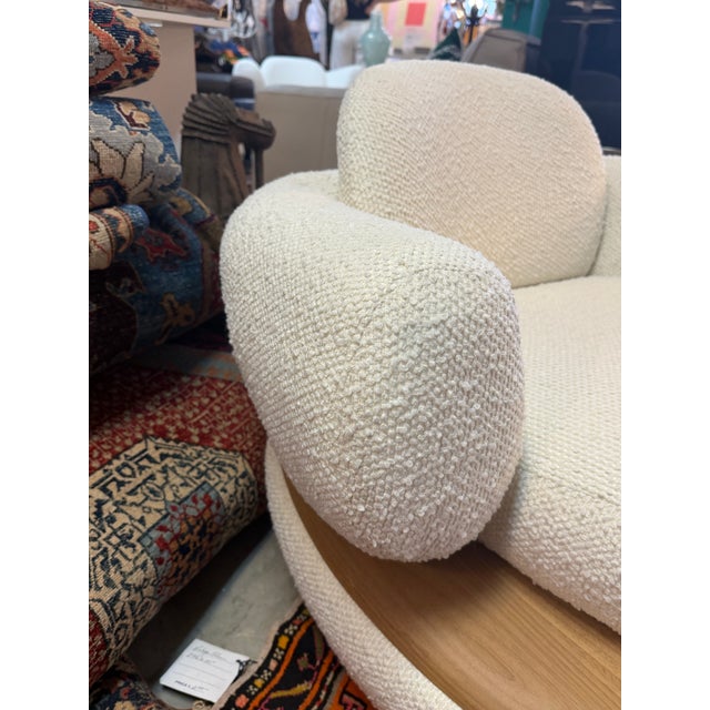 Elegant and fun cream boucle lounge chair. Made in Brazil by Feeling Furniture Collection, this chair is comfortable and...