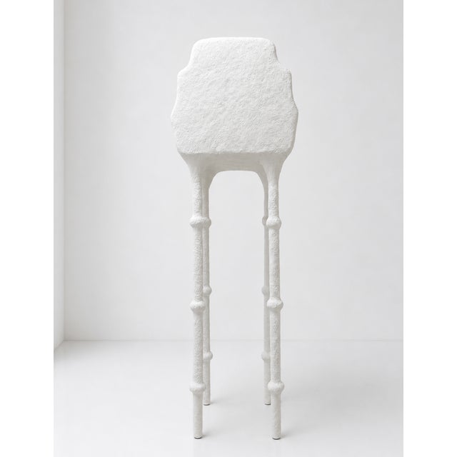 A one-of-a-kind sculptural cabinet featuring an organic textured white finish contrasted with three warm wood drawers. Its...