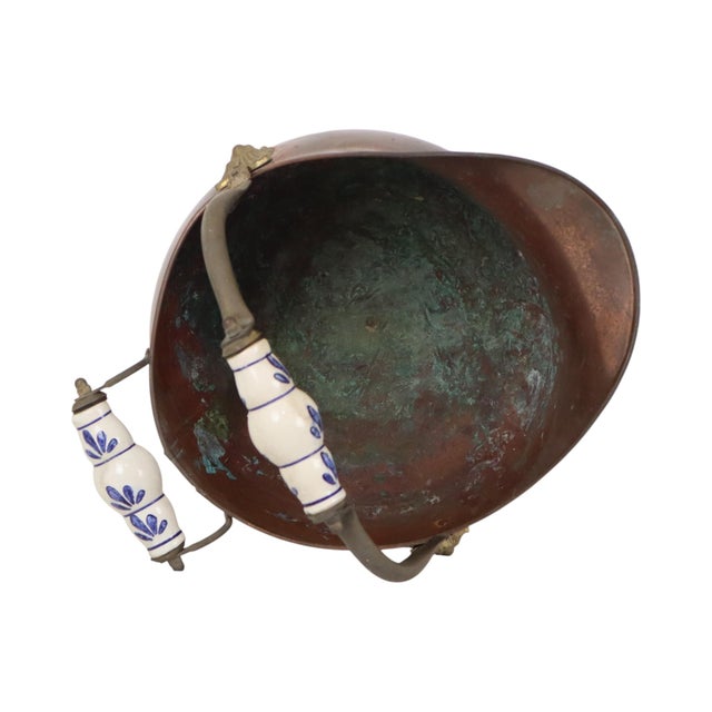 Antique Copper Helmet-Shaped Coal Scuttle with Lion Heads and Delft Ceramic Details For Sale - Image 12 of 15
