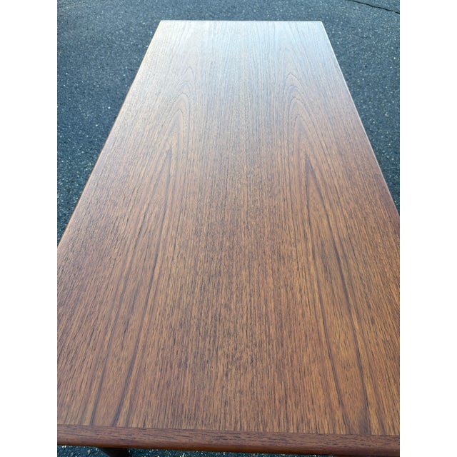 Fantastic vintage Danish teak coffee table ready for its new forever home. This table was completely refinished including...