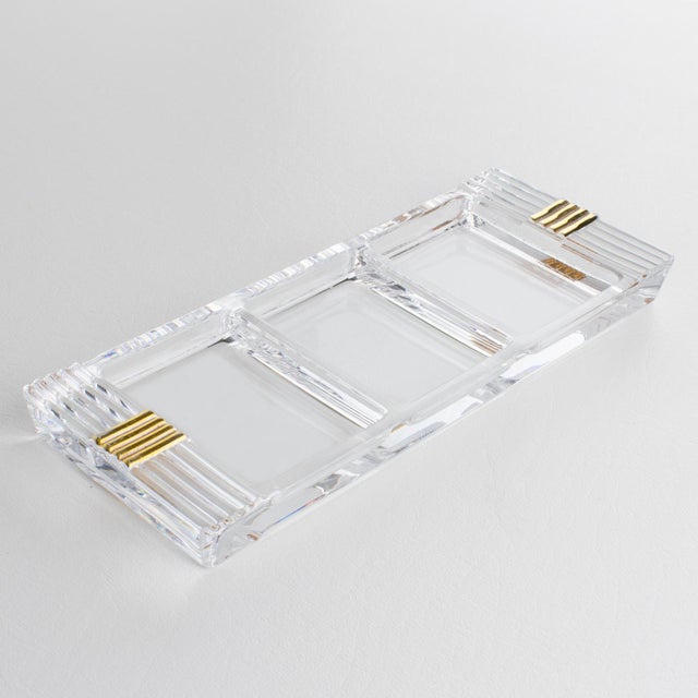 This stunning crystal vide poche, ring holder, or decorative bowl, was designed for the Christian Dior Interior...