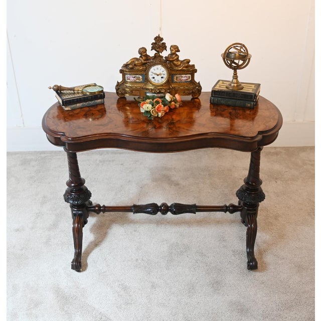 Walnut Victorian shaped centre or stretcher table Figured walnut top carved stretcher base Elegant Victorian mahogany...