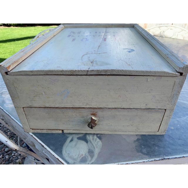 Here we have a very old primitive pine painted document box. Dovetailed construction throughout. It has one drawer and a...