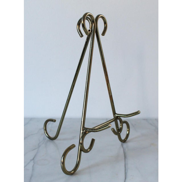 Vintage metal brass tone art easel. No makers mark. Some age wear to finish.