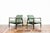 A pair of GFM-64 armchairs designed by Edmund Homa, produced by the Gościcińska Fabryka Mebli (GFM) in Poland during the...