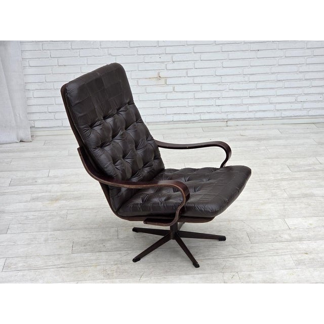 1970s, Scandinavian swivel armchair. Original patchwork furniture leather, bent wood, brown canvas. Original good...