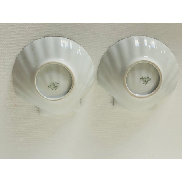 Pair of shell shaped porcelain Limoges France Handpainted by Helen Haupman with florals. small dishes Catchall.