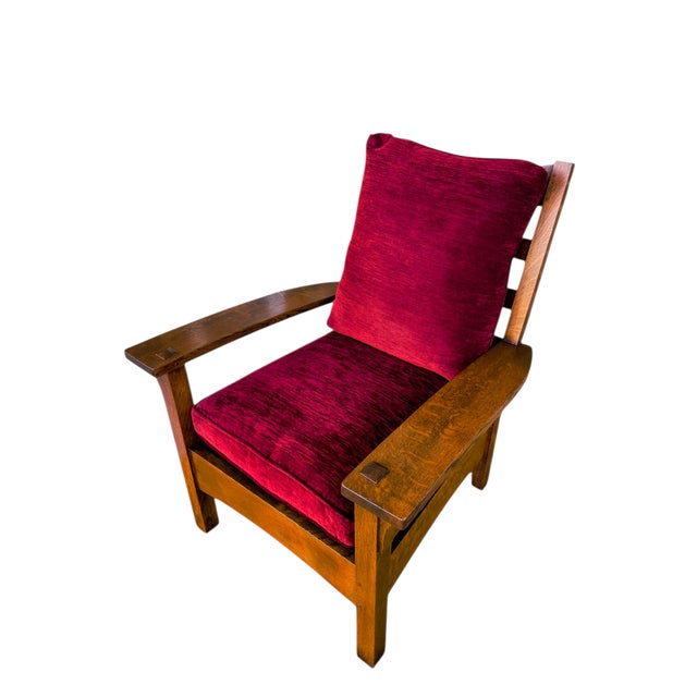 An absolute icon of the American Arts & Crafts revival, this authentic L. & J.G. Stickley Bow Arm Lounge Chair (Model...