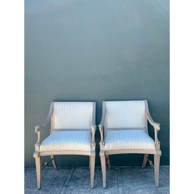 This exquisite pair of Neoclassical armchairs captures the regal elegance of the Empire and Regency eras. Meticulously...