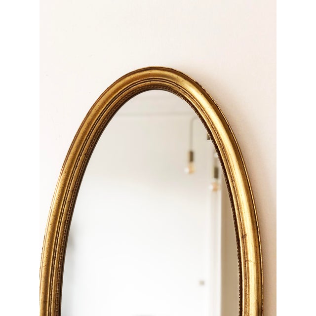 Beautiful vintage full-length oval wall mirror by Deknudt (Belgium), likely from the 1970s–1990s. The wooden frame is...
