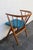 This high quality Chair is made out of wood, solid wood, teak wood, and upholstery. It proudly bears a stamp, "Sibast...
