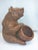 Whimsical Honey pot bear and basket by late artist Bill Huebbe. Made from cast fiberglass showing fur details and finished...