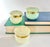 A charming set of three vintage Italian alabaster trinket boxes featuring delicate hand-painted floral motifs, perfect for...