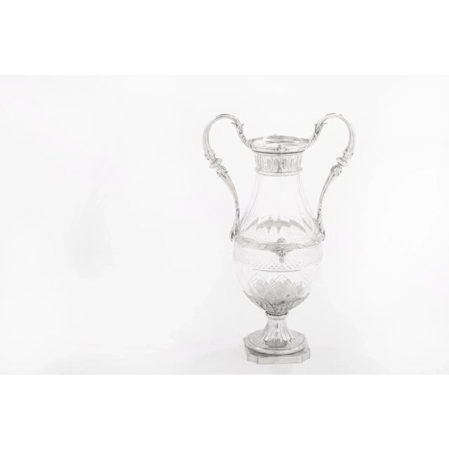 French silver plate mounted framed /cut glass decorative vase with side handles. The vase / piece is in good condition....