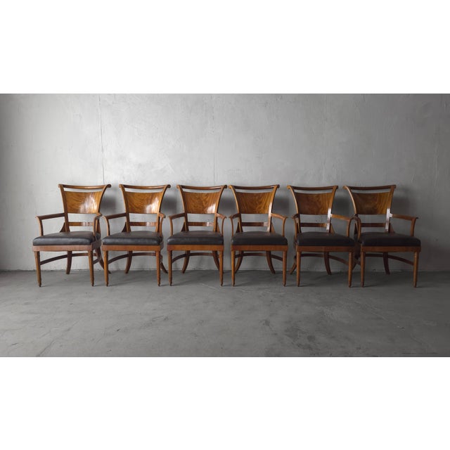 This is an absolutely stunning set of 6 Biedermeier dining room armchairs. The polished, handcrafted walnut burl on these...