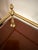 A beautifully crafted Alexander Julian Home Colours sideboard featuring a rich burl wood finish and an elegant solid brass...