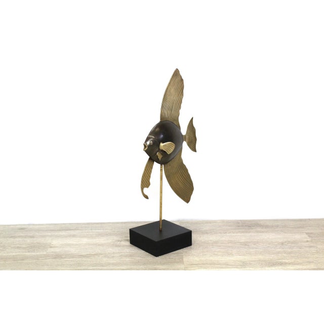 Mid-century brass angel fish nicely displayed on black base minor wear, in great vintage condition Dimensions; 11"Width x...