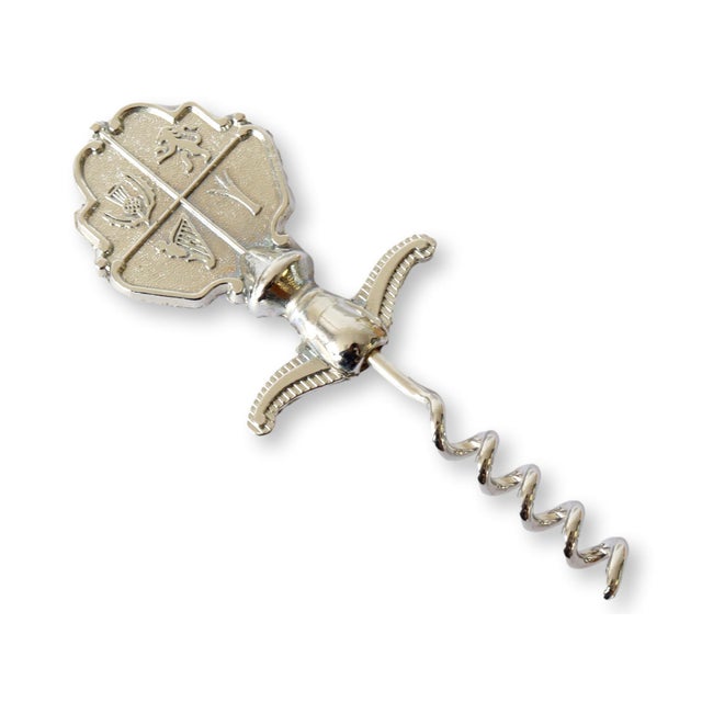 A charming vintage corkscrew featuring a heraldic shield with colorful enamel detailing and the name Margate, the classic...