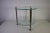 French brass and glass bar cart, France, 1950s. This elegant vintage drinks trolley features two circular clear glass...