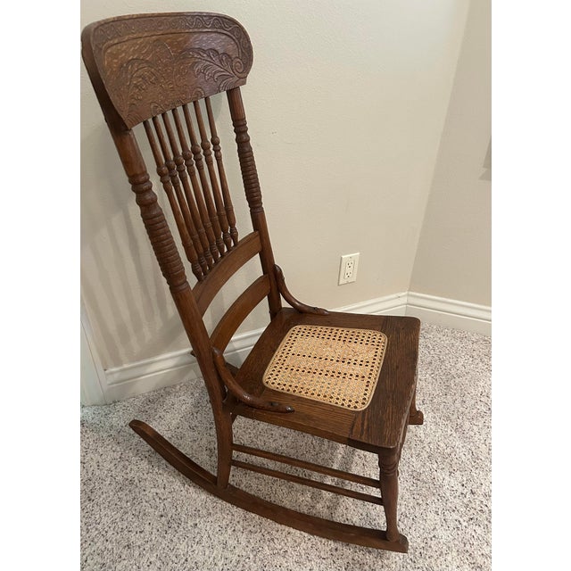 American Vintage Hand-Carved Cane Seat Rocking Chair For Sale - Image 3 of 7