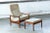 Beautiful highback lounge chair with ottoman probably made around 1970 or early in that decade. It is Danish but we are...