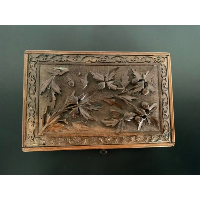 An exceptional 19th-century antique Anglo-Indian Kashmiri keepsake box, masterfully hand-sculpted from premium solid...